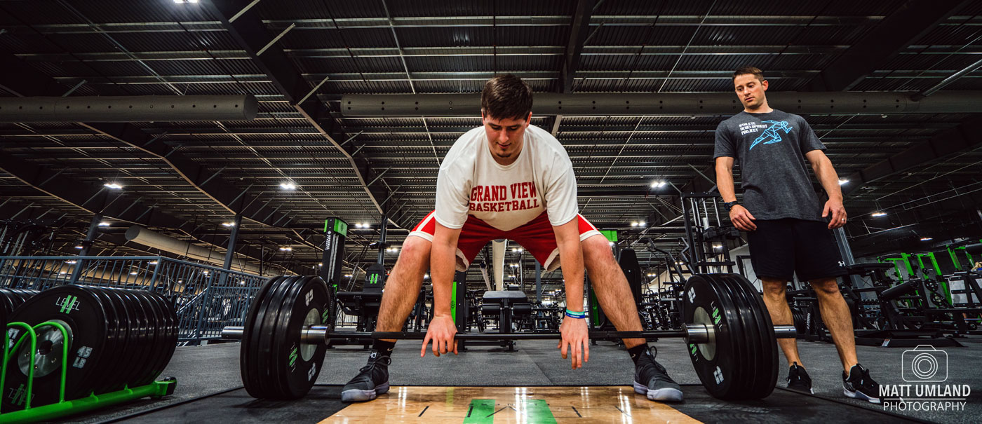 A picture of a man lifting weights